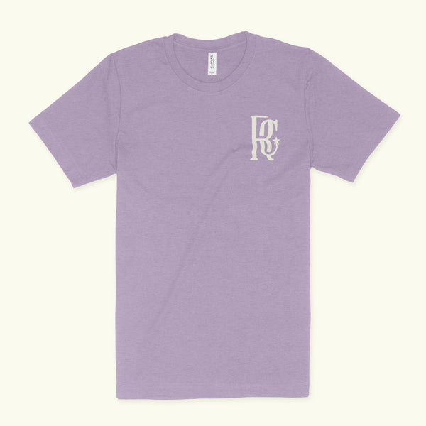 Heather Lavender shirt with the Rhino Coffee monogram on the left breast.